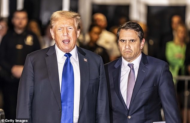 Former President Donald Trump and his attorney Todd Blanche (right) leave the courthouse