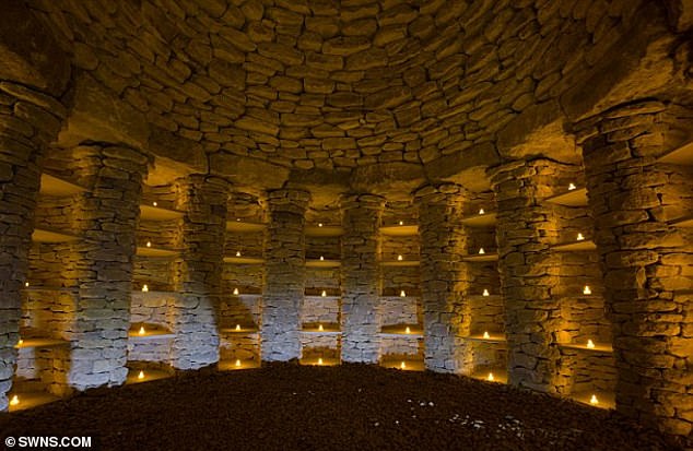 The practice of building the great tomb to store the remains of the dead dates back more than 5,000 years.  Pictured: The interior of All Cannings burial mound showing 'niches' in the walls, each designed to hold urns containing people's ashes