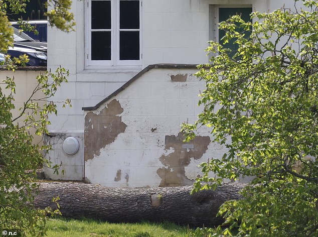 Photos show paintwork chipping and cracks appearing in walls of Prince Andrew's Royal Lodge home