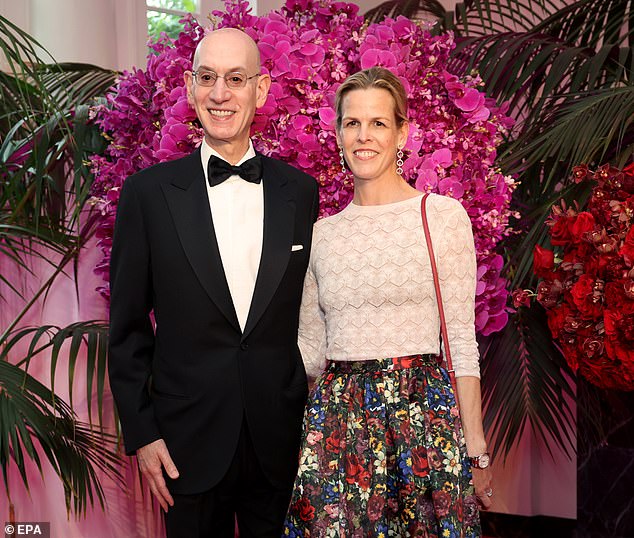 Adam Silver (pictured with wife Maggie Grise) has revealed that talks with TNT are still ongoing