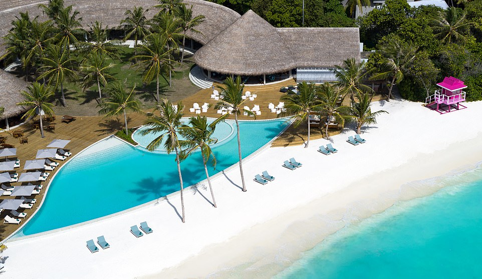 Carol Driver of MailOnline Travel checks into the Ifuru Island Maldives resort (above) with her husband and seven-year-old daughter Amelia