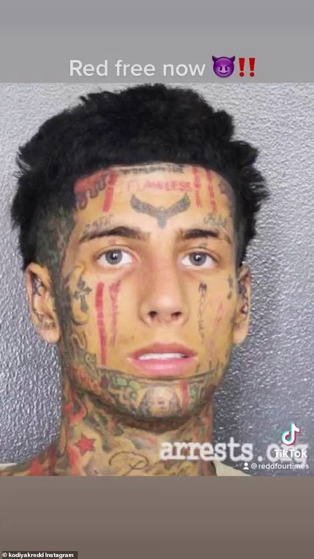 The TikTok star, known for his extensive tattoos and diamond teeth, was booked into the Broward County Jail, pictured in his May 2023 mugshot