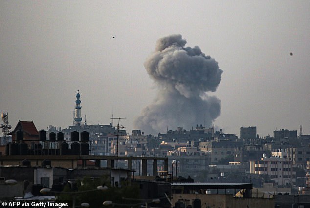 Smoke rises during the Israeli bombardment of eastern Rafah in the southern Gaza Strip, Sunday, amid the ongoing conflict between Israel and Hamas