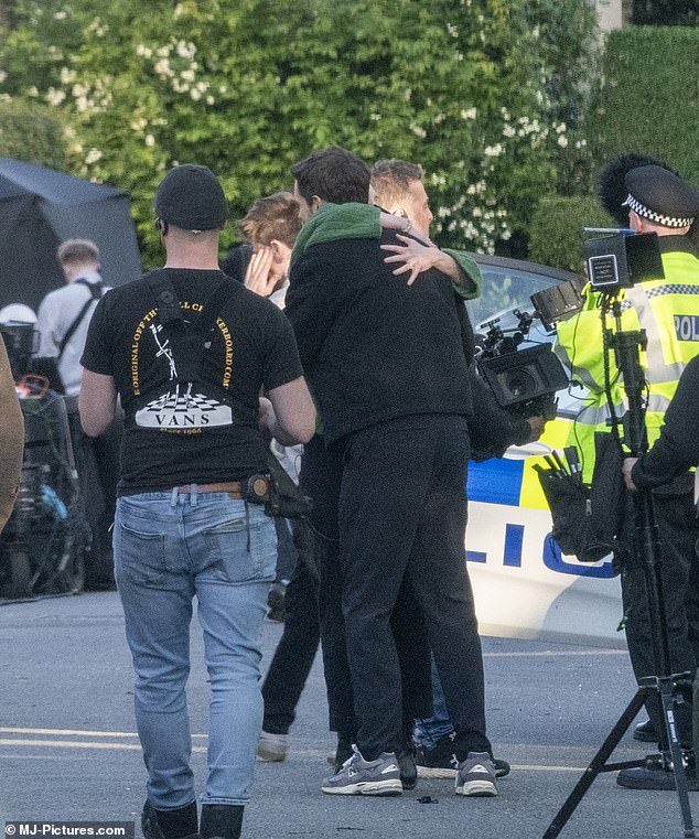 As filming for the day came to a close, the comedian was seen hugging members of the cast and crew