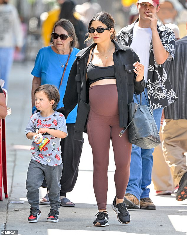 Jenna Dewan showed off her baby bump on Tuesday when she stepped out in Los Angeles with her son Callum