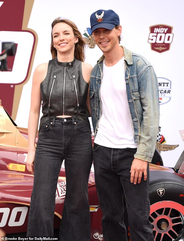 Jodi Comer, 31, joined The Bikeriders co-star Austin Butler, 32, to wave the green starting flag at the annual Indy 500 motorcycle race in Indianapolis on Sunday - after delays due to severe weather