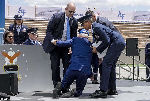 President Joe Biden falls on stage during the 2023 United States Air Force Academy graduation ceremony