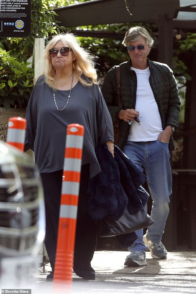 Judy Finnigan and her husband Richard Madeley looked as in love as ever as they enjoyed a lunch date at Spaniards Inn in Hampstead