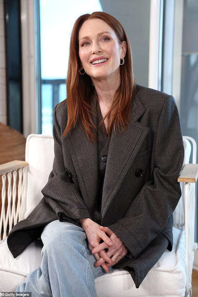 The Still Alice star let her long red locks loose and completed her daytime look with a pair of small gold hoop earrings