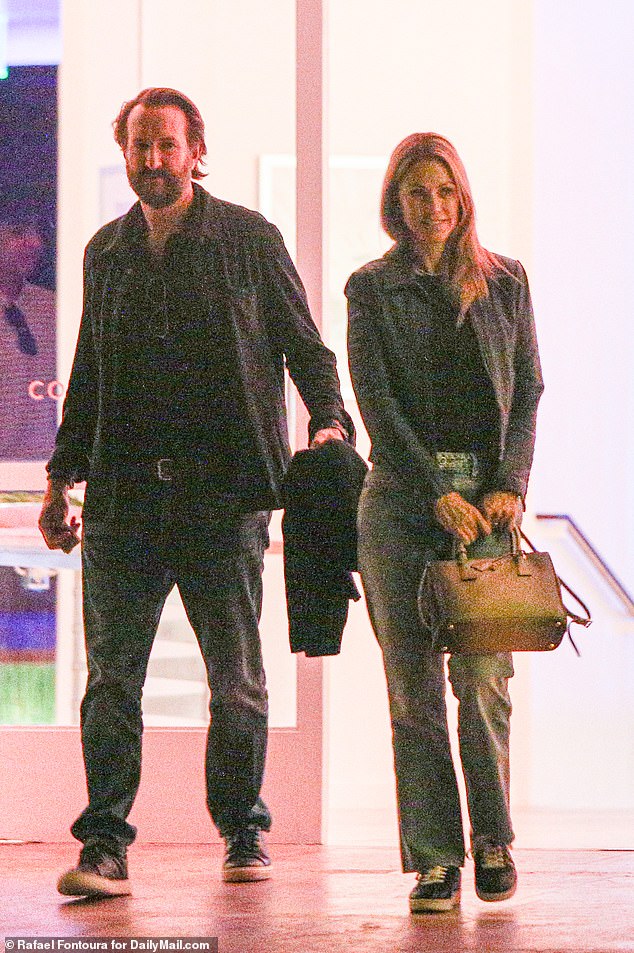 Kevin Costner's ex-wife Christine Baumgartner is said to be 'very happy with' new boyfriend Josh Connor following her split from the actor;  The new couple was photographed at the end of May