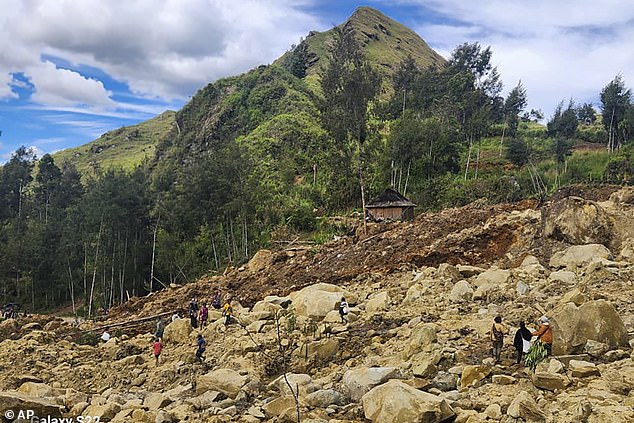 A massive landslide crashed into Yambali village in the country's north in the early hours of Friday while most villagers were sleeping.