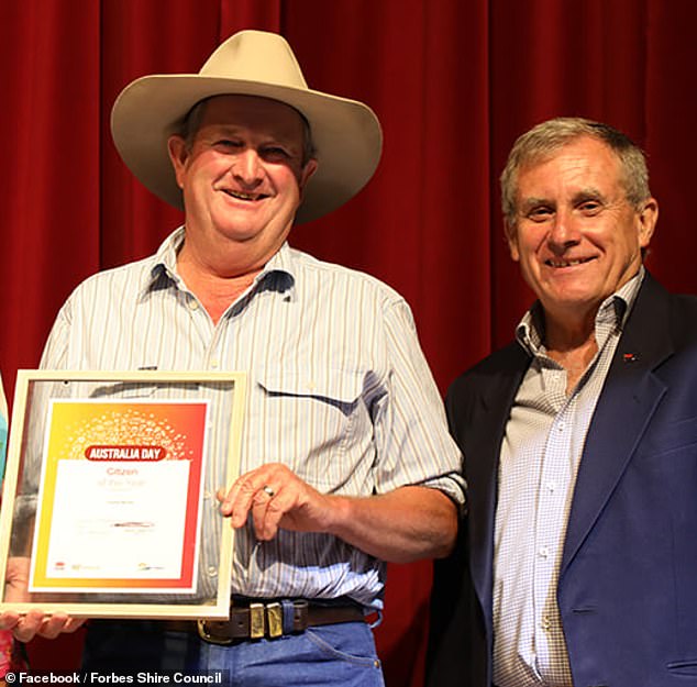 Lawrence 'Laurie' Norris is pictured (center) with the Forbes mayor after receiving his 2022 Citizen of the Year award