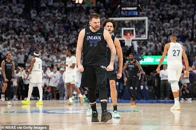 Luke Doncic celebrates his game-winning three-pointer against the Minnesota Timberwolves