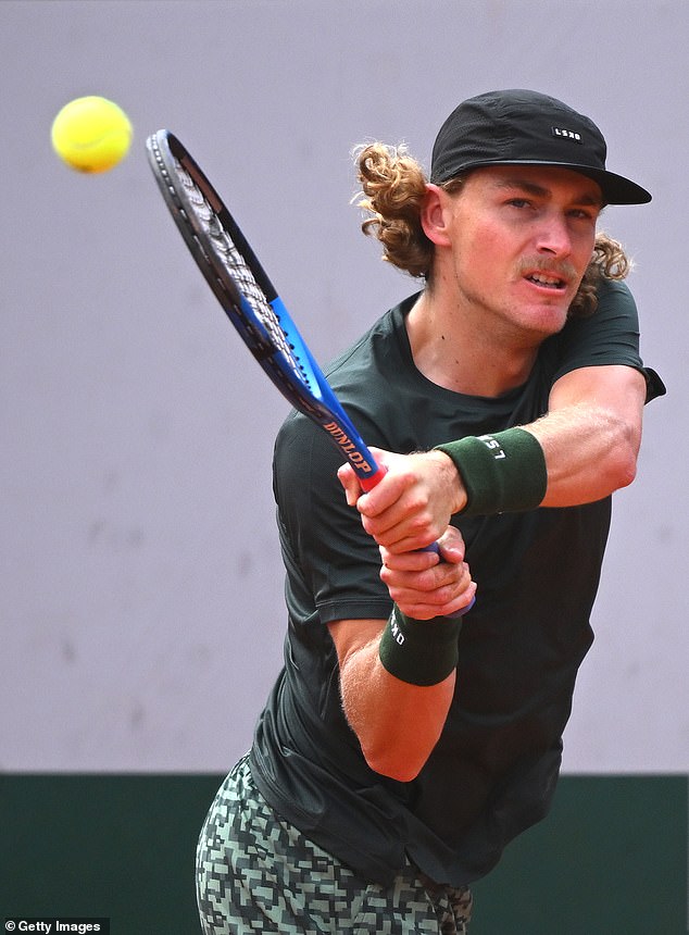 Max Purcell said he did not regret making the bizarre decision to hit an underarm serve on his fifth match point - only to lose in five sets to Henri Squires in Paris