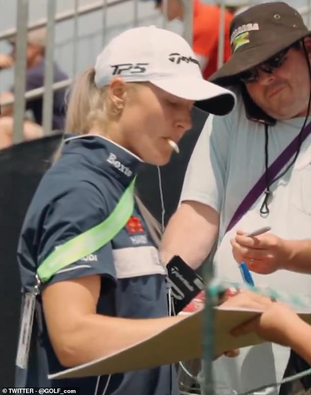 English golfer Charley Hull was seen smoking a cigarette while signing autographs