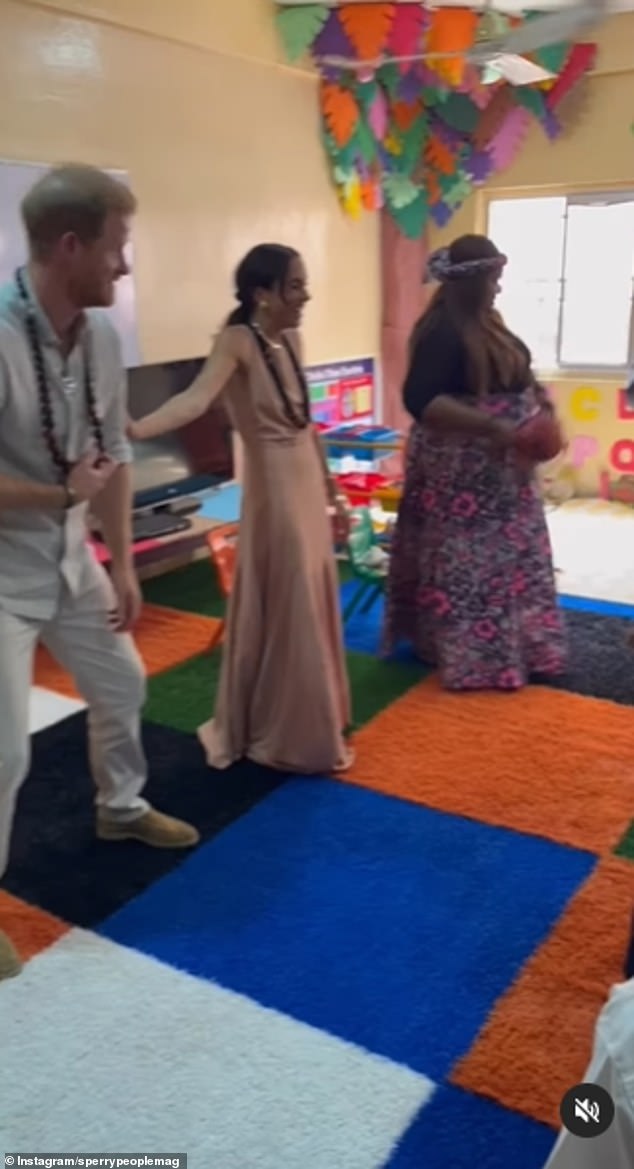 The Duke and Duchess of Sussex took part in a Jump Up, Turn Around dance as they joined children at the Wuse Lightway Academy