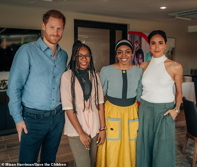 Harry and Meghan pictured with youth ambassadors Maryam, 23, and Purity, 19, during their visit to Abuja