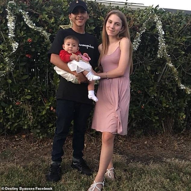 Destiny Marie Byassee, 22, (pictured with her husband Ernesto Donovan Barrientes and her young son) died in a car accident in Florida on June 11 last year