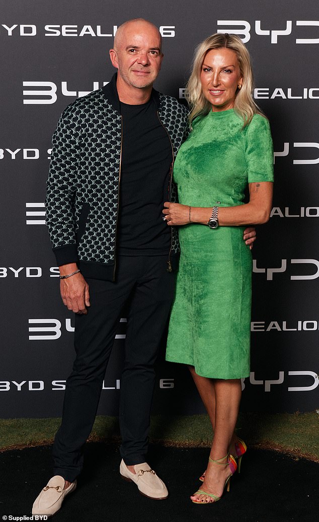 Tania also showed off a huge diamond ring on her finger as she stepped out in Melbourne for the first time with her new partner.  She put on a loving show alongside her new boyfriend Marco Kelly as they posed at the launch of the BYD Sealion 6 SUV electric car at Docklands Studios.  Pictured