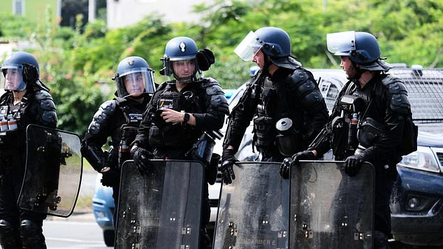 Three dead as rioting and looting breaks out in New Caledonia, with tourists urged to stay away from the island