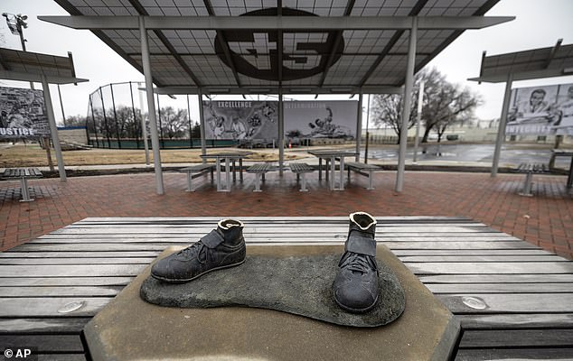 The remaining ankles of a statue of Jackie Robinson outside a park in Wichita, Kansas in January