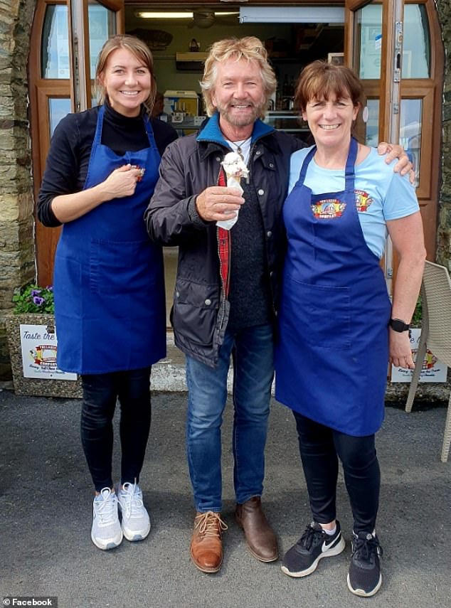 Noel Edmonds, 75, was spotted wearing strange shoes during a trip to the Isle of Man on Tuesday, in a photo shard on social media