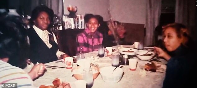 After Newman suffered brain damage from a carbon monoxide leak in the house, Sandra is appointed conservator of the house and fights to save it from demolition.  (Image: Old photos of Karen and her family at the dining room table in the house, decades ago)