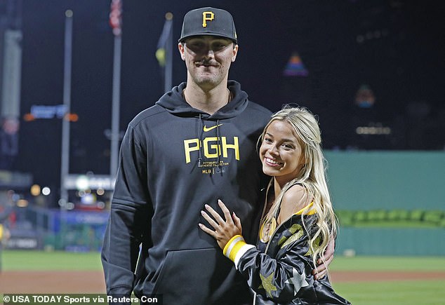 Pirates pitcher Paul Skenes is motivating himself to get more strikeouts this season by starting a good cause.  Pictured Saturday with his girlfriend Livvy Dunne after his MLB debut