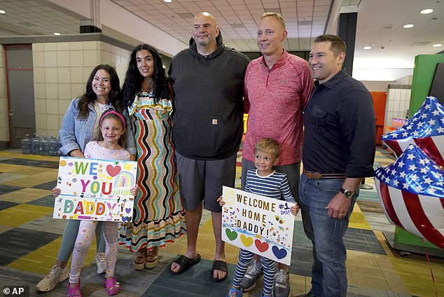 Hagerich, who received a 52-week suspended prison sentence and a $6,700 fine after pleading guilty, is the first of four other Americans detained in Turks and Caicos (Bryan, second from right, with his children, Caroline, 6, and Palmer, 4, his wife, Ashley, Gisele Fetterman, her husband, Sen. John Fetterman, D-Pa., and Rep. Guy Reschenthaler, R-Pa)