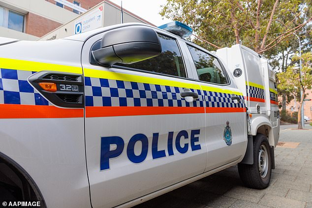 Two men have been charged with murder after a 42-year-old woman was found dead in a hotel room three months ago (stock photo from a Western Australia police vehicle)