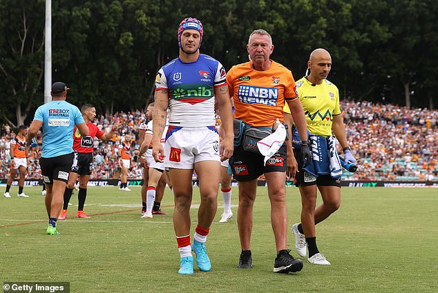 Newcastle captain Kalyn Ponga (pictured being taken off the ground after a collision) is another NRL player who has had major problems with head impacts