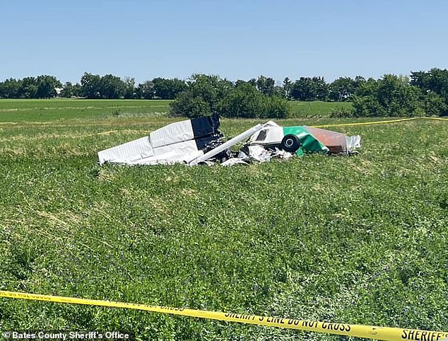 The plane, a single-engine Cessna C206, crashed in a hay field near the airport outside Kansas City just before 1 p.m. Saturday.