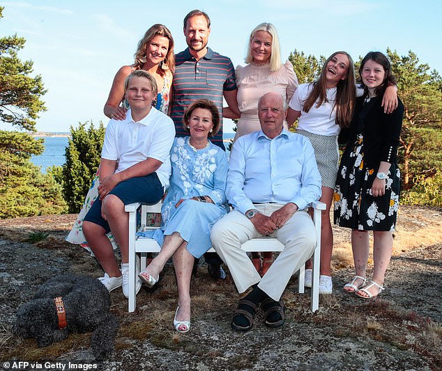 Official photo of the royal family in honor of the 45th birthday of Crown Prince Haakon (above 2nd from left) with his family, posing next to Princess Martha Louise (top left), Crown Princess Mette-Marit (top C), Princess Ingrid Alexandra ( 2nd from right), Maud Angelica Behn (R), (below L-R) Prince Sverre Magnus, Queen Sonja and King Harald V, in July 2018