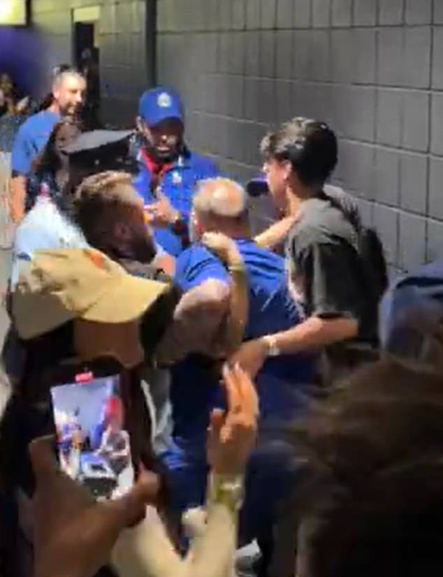 A New York Knicks fan appeared to be kicked out of Wells Fargo Center during Game 6