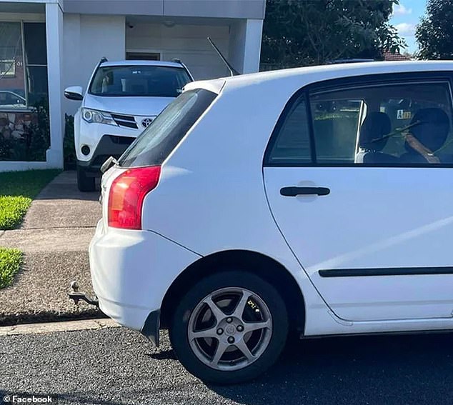 The car (pictured) was almost completely parked in a driveway in Newcastle, NSW, forcing a 4WD visiting their elderly relative to maneuver through the tight space in the front garden.