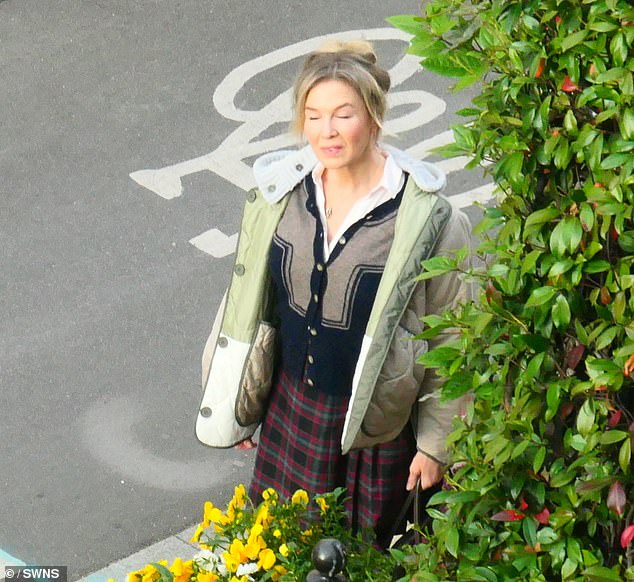 The actress wandered around Haverstock Hill in a mismatched ensemble as she continued filming parts of the upcoming movie
