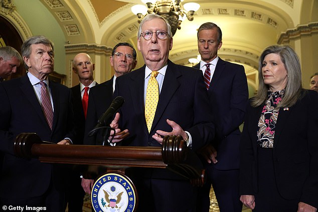 Senate Minority Leader Mitch McConnell (center) announced last week that he would not run for Republican leadership in November.  Sens.  Rick Scott, R-Fla., (second from left) and Sen. John Thune, R-S.D., (second from right) announced they are in the running to replace him.