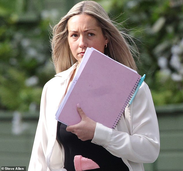 Joynes (pictured, Friday), who wore a pink baby hat tucked into her pants at the dock, wiped away tears on Friday as the witness added: 'I have also been thinking about my child's future.  I also want the best for my child'