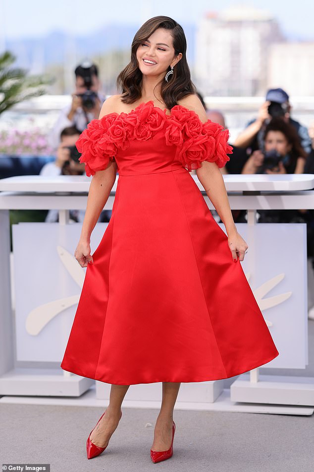 Selena Gomez wowed in a red ruffled dress as she joined Zoe Saldana in a photocall for their new film Emilia Perez during the Cannes Film Festival on Sunday