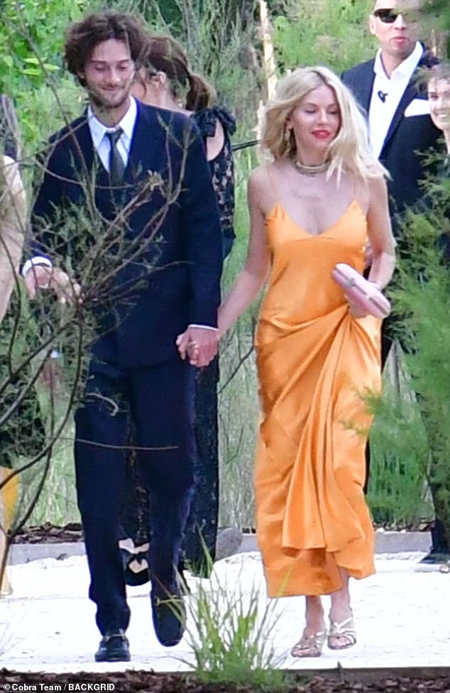 Sienna Miller, 42, looked nothing short of sensational as she and boyfriend Oli Green, 27, attended billionaire David Winter's wedding in Venice on Saturday.