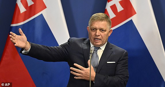 FILE - Slovak Prime Minister Robert Fico speaks during a press conference with Hungarian Prime Minister Viktor Orban at the Carmelite Monastery in Budapest, Hungary, Tuesday, January 16, 2024. Slovak populist Prime Minister Robert Fico was injured in a shooting Wednesday, May 15, 2024 and taken to hospital .  (AP Photo/Denes Erdos, file)