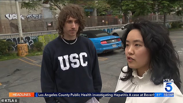 Lydia Ren, Schneider's lookout (pictured together) during the stunt, said she was 