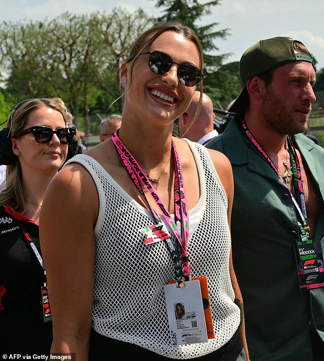 The tennis star was all smiles as she walked with Frangulis at the Emilia-Romagna Grand Prix this weekend