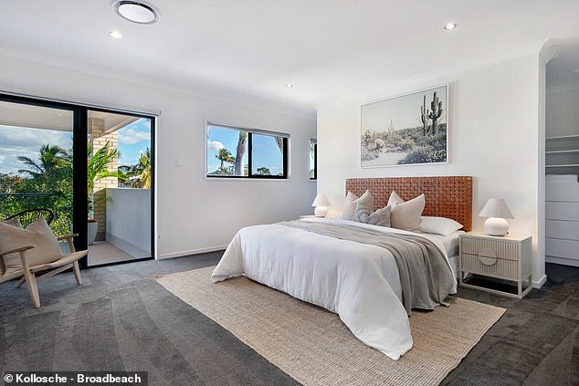 He first put his Broadbeach Waters home on the market for $2.95 million in October 2023, but was unable to find a buyer before eventually selling it at auction (pictured: one of the modern bedrooms)