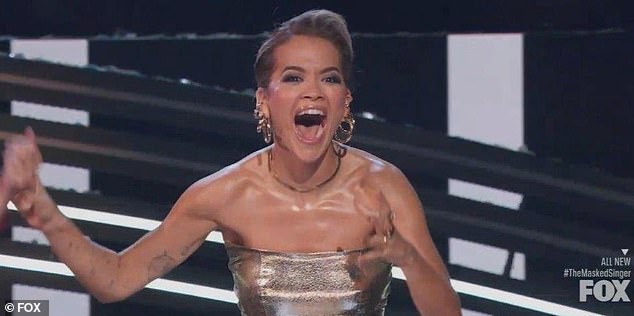 Rita Ora celebrated after becoming the only panelist to correctly guess that Thelma Houston was the Clock on Wednesday's episode of The Masked Singer on Fox