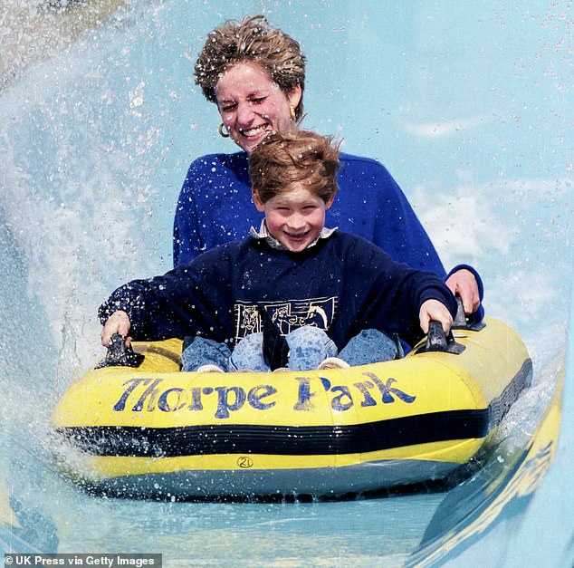 Diana, Princess of Wales, enjoys a joyful moment with Prince Harry during the Depth Charge ride at Thorpe Park in 1992