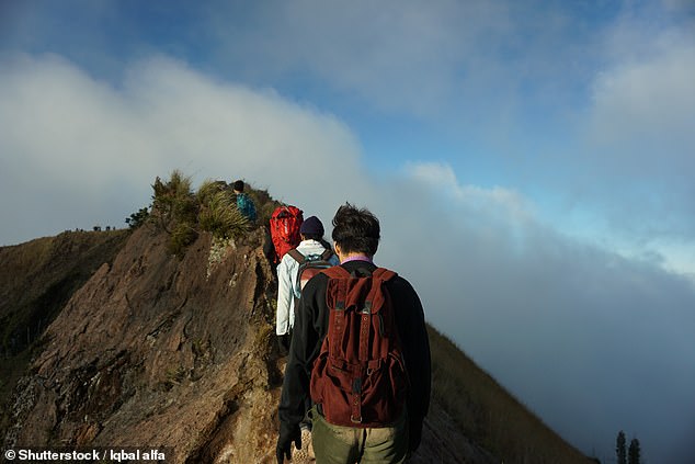 Mount Batur hike on the Indonesian island of Bali, with Mount Agung in the background