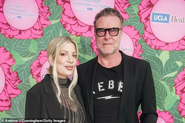 Tori Spelling and her estranged second husband, Dean McDermott, may be ready to leave their 17-year marriage behind in divorce court, but their financial entanglements are far from over as City National Bank is suing the former couple over an outstanding 12- one-year loan of $400,000 (photo June 10)