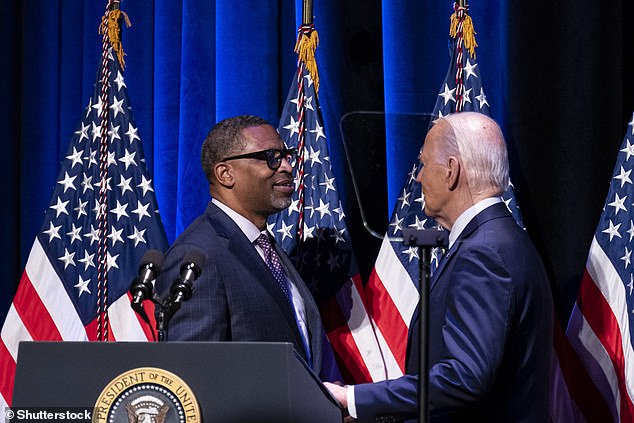 Derrick Johnson, president of the NAACP, greets US President Joe Biden at the National Museum of African American History and Culture in Washington DC on Friday.  Biden is currently touring the country in an effort to shore up his dwindling support among Black voters