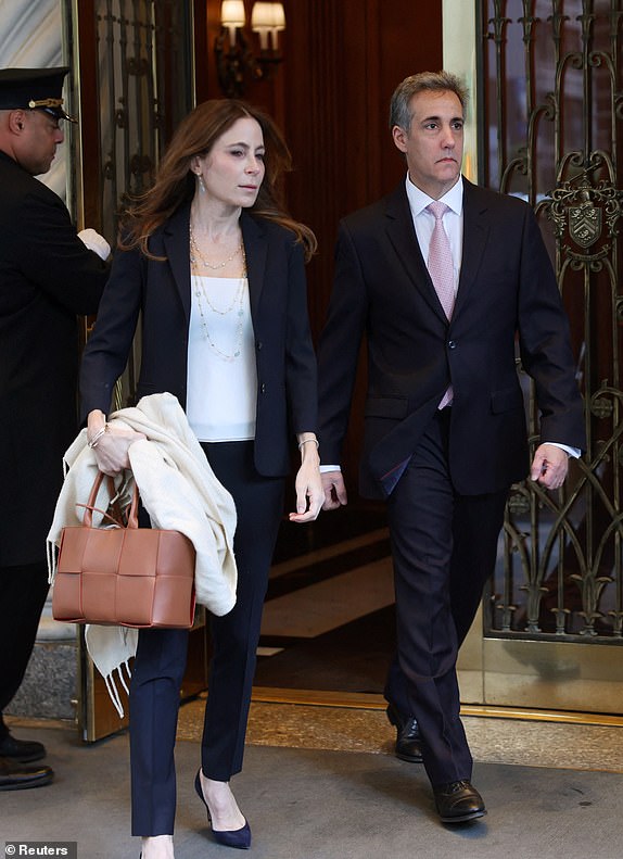 Michael Cohen, former lawyer for Republican presidential candidate and former US President Donald Trump, leaves his Manhattan home to testify in Trump's criminal trial on charges that he falsified business records to hide money paid to porn star Stormy Daniels in 2016 to silence, in New York City, US, May 13, 2024. REUTERS/Mike Segar